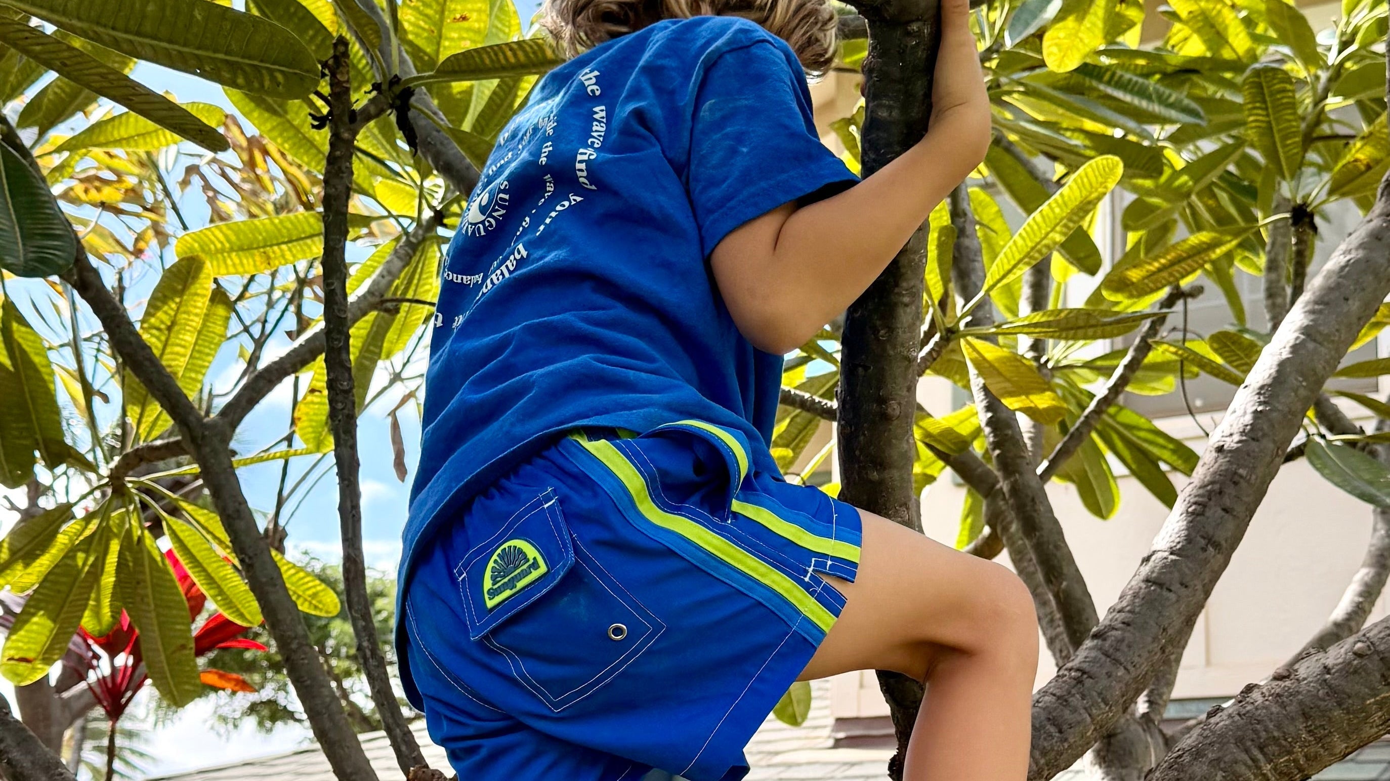 Boys Eddie Swim Trunks in bright beach-ready colors for pool days and family vacations