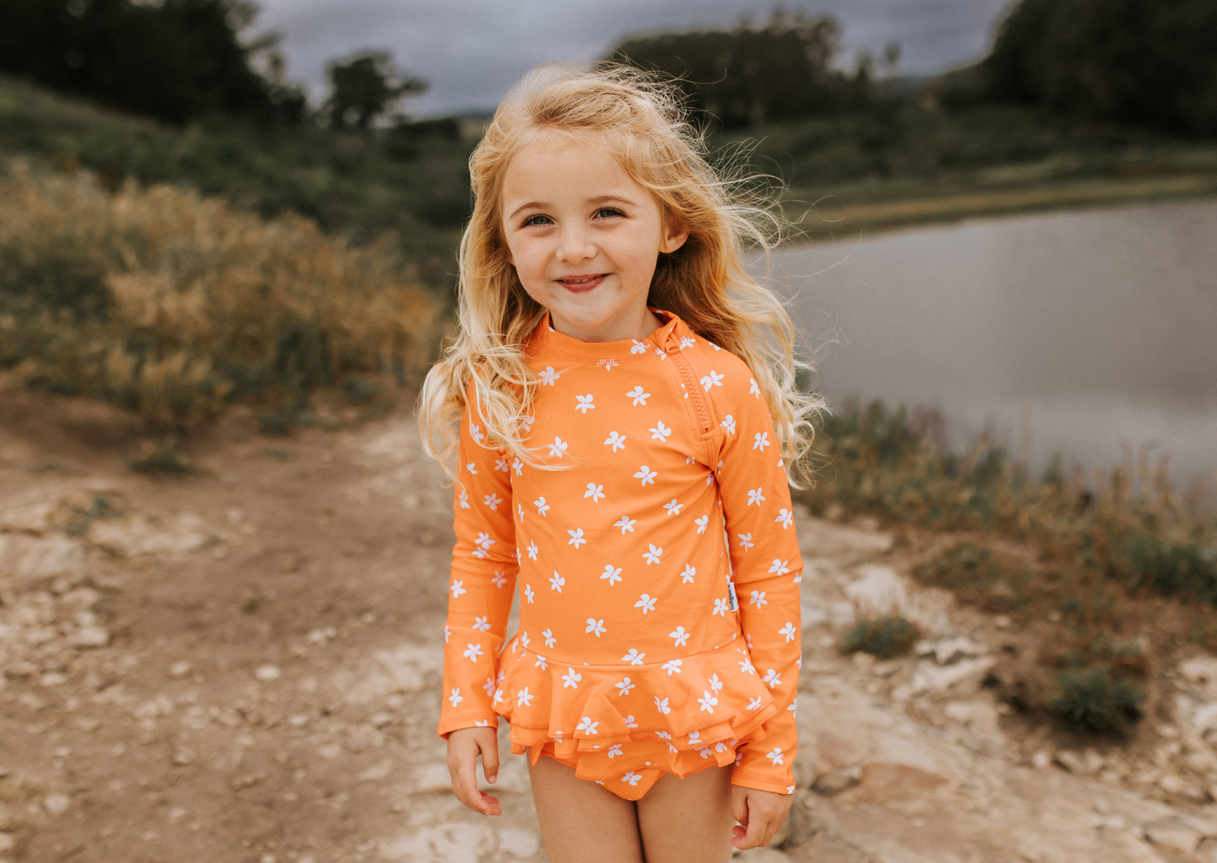 Why Bright Orange Swimwear Helps Kids Stand Out in the Water