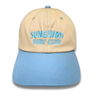 Beige and blue cap with 'Sunguard Surf Club' text on a white background