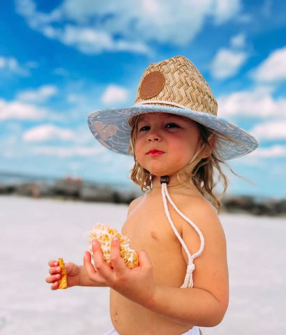 Sunguard straw lifeguard hat on toddler boy at the beach